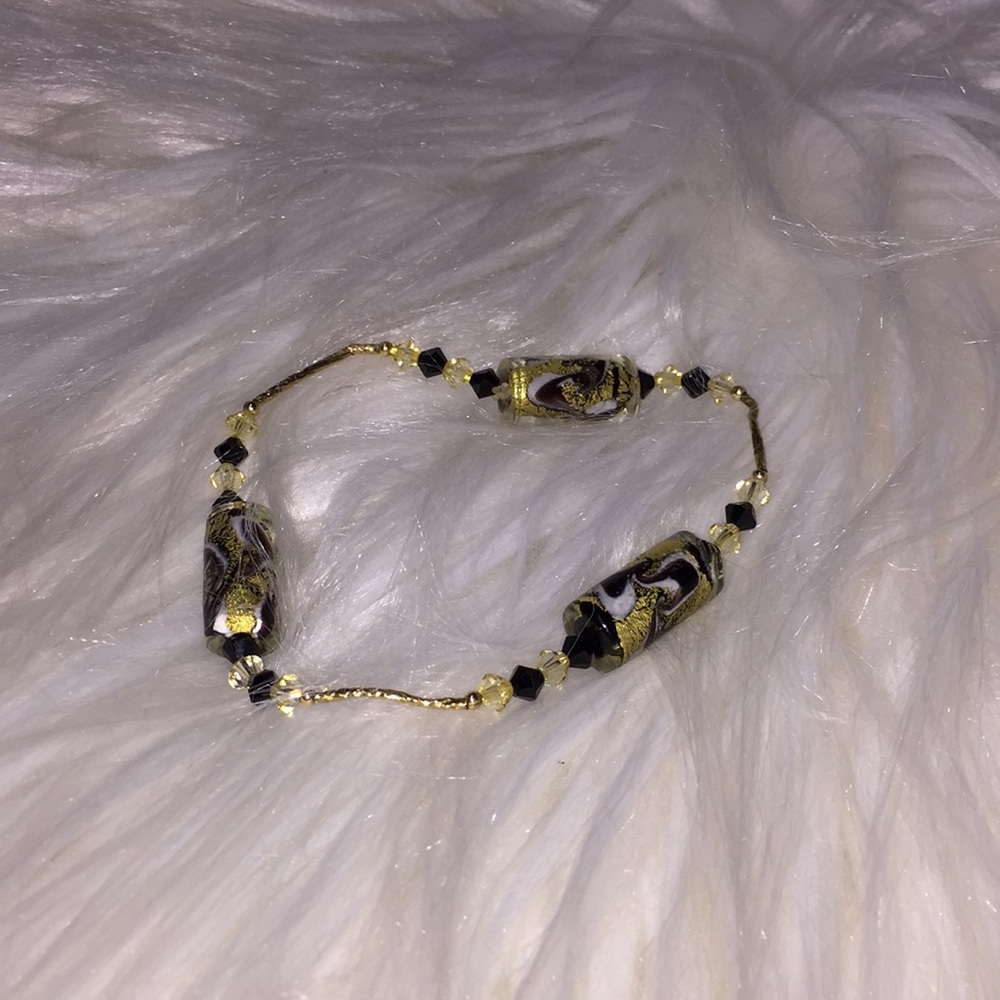Beautiful gold and black handmade bracelet.